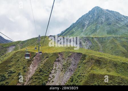 Summer views of Caucasus landscapes from the 7.5km Kobi-Gudauri cable car, connecting Kobi and Gudauri ski resorts. Opened Jan 2019, Poma equipment Stock Photo