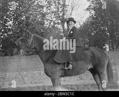 Race horse owner , Mrs Volterra , wife of Leon Volterra , rides ' Mary Tudor II ' , the Cambridgeshire favourite . 30 October 1934 Stock Photo