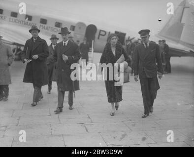 Wife of Commander in Chief in India arrives home by air . Lady Chetwode , wife of Field Marshal Sir Philip Chetwode , Commander in Chief in India , arrived at Croyden by air from Karachi . Photo shows , Lady Chetwode on arrival at Croydon . 12 November 1935 Stock Photo
