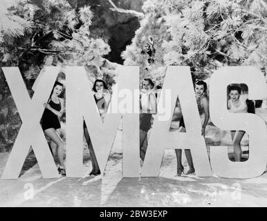 Christmas greetings , from Hollywood . Five Hollywood film girls contrive to make it a ' white ' christmas even in the sunny film centre . The girls are Esther Dressman , Kay Gordon , Bonita Parker , Bonita Parker , Dorothy Thompson and Dene Myles . 21 December 1935 Stock Photo