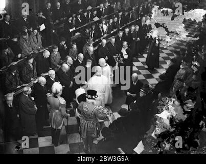King Edward VIII himself took part in the 60 year old ceremony of distributing Maundy Money at Westminster Abbey on Maundy Thursday . This is only the second time that a reigning King has attended the service in 200 years . The late King George was present in 1934 . At the service the King handed the specially minted coins to as many deserving old men and women as he has years of age , 42 . Eighty four people benefited . The gentlemen of the Royal Almonry wore towels during the ceremony to symbolise the time , hundred ' s of years ago , when King ' s washed the feet of poor people . Photo show Stock Photo