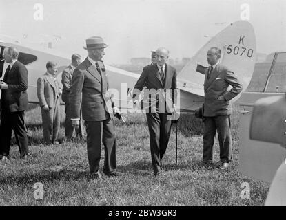 Samuel Hoare arrives in Paris on way to Geneva . Sir Samuel Hoare ( centre with stick ) , the Foreign Minister , with Sir George Clerk , British Ambassador ( left ) arrived in Paris from Hendon on his way to Geneva to attend League Assembly tomorrow ( Monday ) . 6 September 1935 Stock Photo