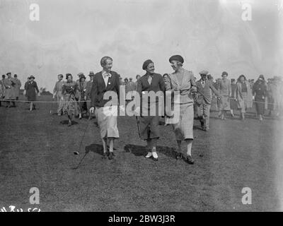 American Curtis Cup golfers meet English Women at Sandy Lodge . The United States women ' s golf team who are to defend the Curtis Cup against Britain on May 6 , met a team of well known English golfers who are not include in the British side in a friendly match at Sandy Lodge , Hertfordshire near London , before leaving for Gleneales . Each American was partnered by a British player . Photo shows , Miss Enid Wilson ( England ) , Miss Marion Miley ( American ) and Miss Joyce Wethered ( England ) followed by a gallery on the course . 27 April 1936 Stock Photo