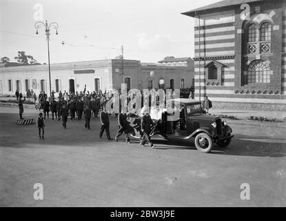 First airman killed in Abyssinian war given military funeral . The first airman killed in the Abyssinian war , Sergeant Birngo Dalmazio , a 24 year old flight sergeant and mechanic of the Italian forces who was wounded while on a bombing raid , was buried with full military honours in Asmara . Dalmazio , , who was hit by a dum dum bullet while flying with Lieutenant Sanze on a bombing raid on a decoy native camp in the valley between Enda Micael and Buja , was taken to hospital at Asmara but died from his wounds . Photo shows , the funeral procession through the streets of Asmara . 28 November Stock Photo