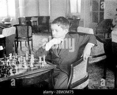 Lost in her game . Chess champions from every part of the world are  competing in the second annual Chess Congress which has opened at the Grand  Hotel , Margate . One