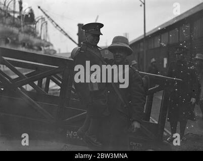 Boy Clements aged 15 ( being held aloft ) , is one of the smallest soldiers in the British army . 1935 Stock Photo