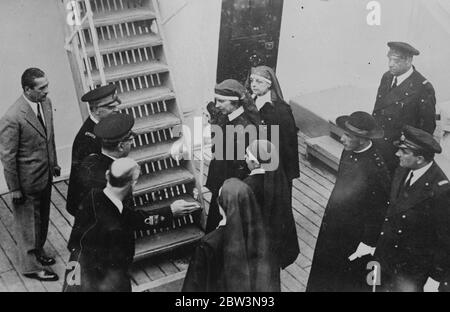 Italian crwn Princess inspects hospital ship . The Princess of Piadmont , wife of the heir to the Italian throne , wore nurse 's uniform when she inspected a hospital ship just returnedfrom the East African war zone at Naples . Photo shows , the Princess of Piedmont inspecting the hospital ship . 12 November 1935 Stock Photo