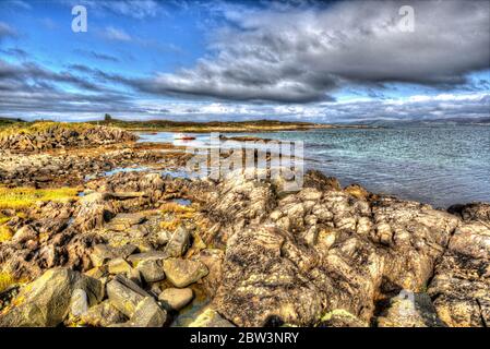 Isle of Gigha, Scotland. Artistic tranquil view of the coastline at Ardminish Bay, on the Isle of Gigha. Stock Photo