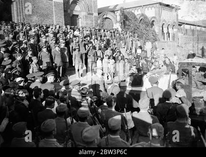 First airman killed in Abyssinian war given military funeral . The first airman killed in the Abyssinian war , Sergeant Birngo Dalmazio , a 24 year old flight sergeant and mechanic of the Italian forces who was wounded while on a bombing raid , was buried with full military honours in Asmara . Dalmazio , , who was hit by a dum dum bullet while flying with Lieutenant Sanze on a bombing raid on a decoy native camp in the valley between Enda Micael and Buja , was taken to hospital at Asmara but died from his wounds . Photo shows , the coffin being placed on a truck after the funeral service at As Stock Photo