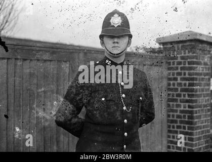 Policeman cycles in pursuit of run away horse . Jumps from machine to clutch reins , and then dragged 40 yards . P C Leslie Poole , cycling out of a turning at Southend saw a rideless horse flash past . He gave chase and drew about level about about quarter of a mile away . The constable threw himself from his machine and grasped the horse ' s reins . The runaway dragged him 40 yards before it came to a standstill . It transpired that the horse had bolted after he has thrown his rider . Photo shows , P C Leslie Poole after he had stopped the runaway horse . 2 December 1935 Stock Photo