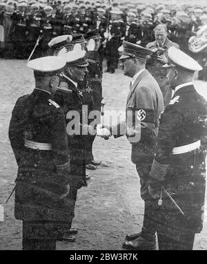 Hitler Talks With Foreign Naval Officers Photo shows : Chancellor Hitler in earnest conversation as he shook hands with foreign naval officers after having inaugurated the new German memorial to sailors at Laboe [ Laboe Naval Memorial aka Laboe Tower ] 1 June 1936 Stock Photo