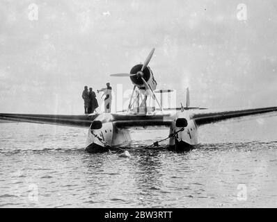 The Italian Air Marshall Italo Balbo became famous for organizing a squadron of S.55s for Atlantic crossings, culminating in his 1933 flight From 1 July - 12 August 1933 , The Italian Air Marshall Italo Balbo led a flight of 24 Savoia-Marchetti S.55 flying boats on a round-trip flight from Rome to the Century of Progress International Exposition in Chicago, Illinois. The flight had seven legs : Orbetello - Amsterdam - Derry - Reykjavík - Cartwright, Labrador - Shediac - Montreal ending on Lake Michigan near Burnham Park. It was his second Atlantic crossings . Photo shows : The Italian Air Mars Stock Photo