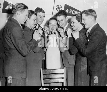 Seven healthiest people in America . Four men and three girls . Four young men and three girls were selected as the most healthy people in the United States in a national contest . The seven are Howard Cobb , aged 18 of Greene , New York , Frederick Abel , aged 20 of Gadsden , Alsbaba , J Alton Riffle , aged 20 of Pleasant Hill , Missouri , Charles Jordan aged 17 of Beloit , Kansas , Eloise Garrett , aged 15 of Uriah , Alsbara , Marion McLaughlin aged 15 of Trenery , Michigan and June Gastine aged 15 of Ridgeway , South Carlina . Photo shows , the healthy seven with their favourite drink , mil Stock Photo