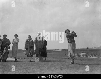 American women ' s golf captain in play at Sandy Lodge . Eighteen year old Miss Patty Berg ' baby ' of the American women ' s golf team was the centre of interest when the team played a series of games with well known English women players at the Sandy Lodge course , Hertfordshire , near London . Most interest seemed to be centered on Miss Patty Berg , the 18 year old ' baby ' of the American team , who is hailed as a wonder golfer . Photo shows , Mrs Glenna Collett Vera captain of the American team , driving from the seventh . 27 April 1936 Stock Photo