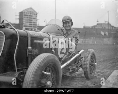 Woman driver takes up midget car racing . Fay Taylor , well known ...