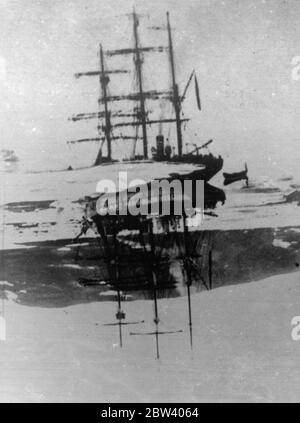 Famous French Polar explorer and crew drowned when ship founders in Iceland storm. Sailing on his last voyage, Dr Jean Baptiste Charcott, Shackleton of France and 29 members of the crew of his famous Polar exploring ship the Pourquoi-Pas (449 tons) were drowned when the vessel sank in a storm in Faxa Bay, Iceland. The ship ran aground, but terrific waves breaking over her prevented the launching of the lifeboats. Every man was washed overboard, and only one survived. Dr Charcot was 69, led two expeditions to the South Polar regions. Photo shows: The Pourquoi Pas in the ice off Greenland. 17 Se Stock Photo