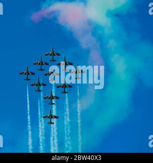 Italian aerobatic team Frecce Tricolori (Tricolor arrows) performs the show with Aermacchi MB-339 aircrafts at Bari (ITALY) Airshow on the feast of St Stock Photo