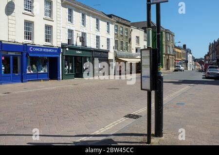 An empty street scene due to the coronavirus scare - taken on a usually busy Friday morning in May 2020 Shaftesbury, Dorset UK Stock Photo