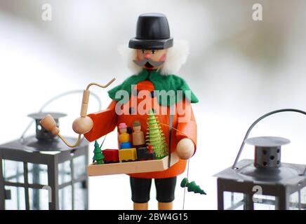 Nostalgic wooden vendor figure from the german Erzgebirge region Stock Photo