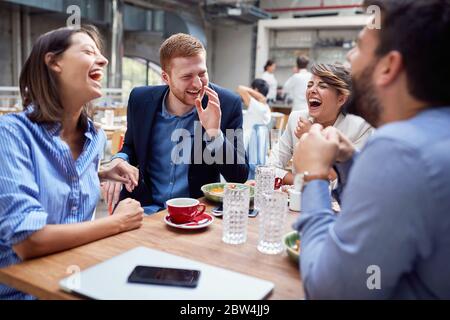 Large casual business group of coworkers having fun on a break Stock Photo