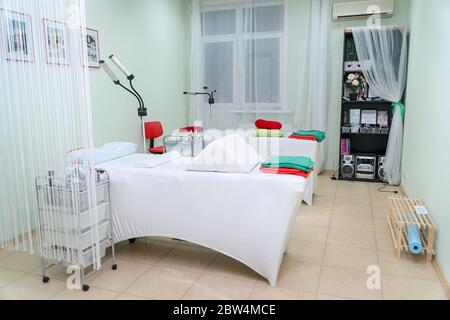 Orthopedic pillows with a memory effect on the couches in the office of the lashmakers. Lashmaker workplace Stock Photo