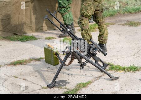 A light machine gun on bipod with telescopic sights. Russian weapon Stock Photo