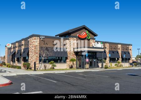 Victorville, CA / USA – February 11, 2020: Chili’s restaurant exterior building located in Victorville, California, adjacent to Interstate 15. Stock Photo