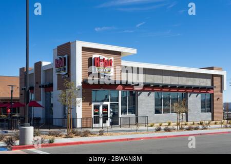 Victorville, CA / USA – February 11, 2020: Habit Burger Grill restaurant located in Victorville, California, adjacent to Interstate 15. Stock Photo