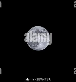 View at Full moon on a black sky as the background Stock Photo