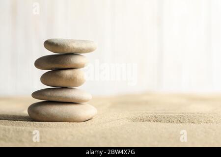 Stones on the sand background. Zen concept Stock Photo