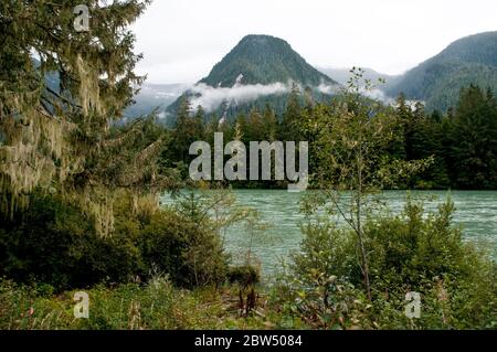 The Wannock (Wanukv) River and coast mountains in Wuikinuxv First Nation Territory, Great Bear Rainforest, central coast, British Columbia, Canada. Stock Photo