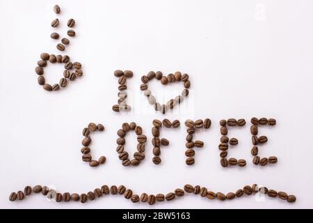 Coffee beans inscription i love coffee arabica and coffee cup on a white background Stock Photo