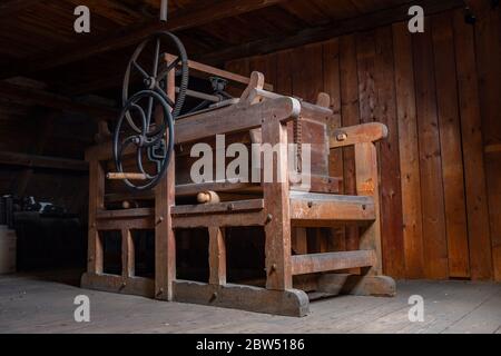 Antiquity - Historical German clothes wringer (mangle) in the attic Stock Photo