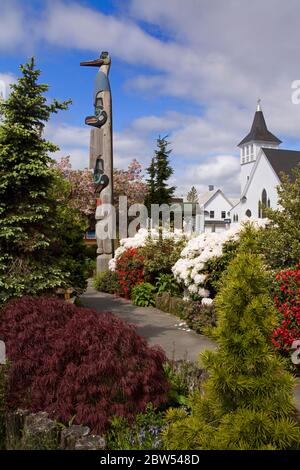 Chief Kyan Totem Pole in Whale Park, Ketchikan, Southeast Alaska, USA Stock Photo