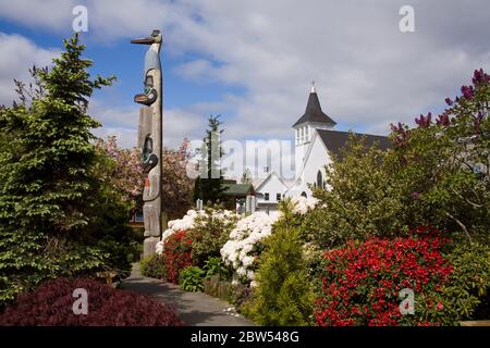 Chief Kyan Totem Pole in Whale Park, Ketchikan, Southeast Alaska, USA Stock Photo