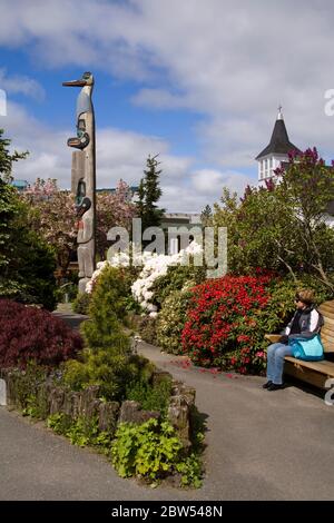 Chief Kyan Totem Pole in Whale Park, Ketchikan, Southeast Alaska, USA (model released) Stock Photo