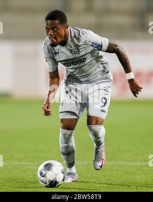 Freiburg Im Breisgau, Germany. 29th May, 2020. Football: Bundesliga, SC Freiburg - Bayer Leverkusen, 29th matchday at the Black Forest Stadium. Leverkusen's Leon Bailey is on the ball. Credit: Ronald Wittek/epa/Pool/dpa - IMPORTANT NOTE: In accordance with the regulations of the DFL Deutsche Fußball Liga and the DFB Deutscher Fußball-Bund, it is prohibited to exploit or have exploited in the stadium and/or from the game taken photographs in the form of sequence images and/or video-like photo series./dpa/Alamy Live News Stock Photo