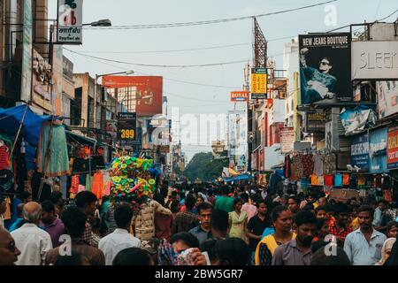 A packed inner city street on a Sunday evening in Pondicherry, India Stock Photo