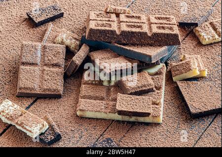Pieces of chocolate covered with cocoa powder Stock Photo