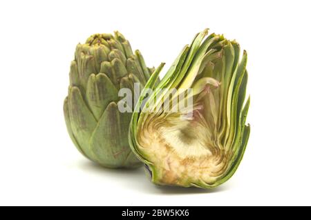 Close-up of some artichokes cut in half and isolated on a white background Stock Photo