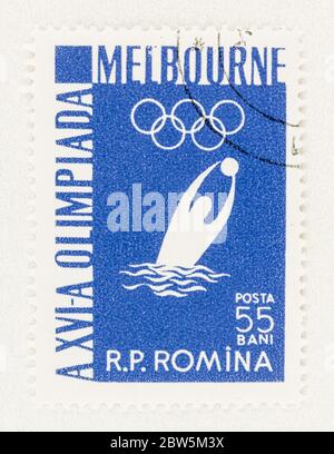 SEATTLE WASHINGTON - May 27, 2020:  Water polo player on Romanian stamp, commemorating the 1956 Summer  Olympic games in Melbourne Australia. Stock Photo