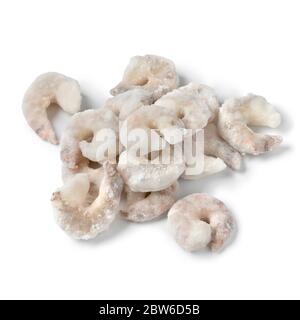 Heap of frozen raw shrimps close up isolated on white background Stock Photo