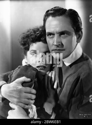 KATHERINE HEPBURN as Mary Queen of Scots and FREDRIC MARCH as Earl of Bothwell Portrait by Ernest BACHRACH for MARY OF SCOTLAND 1936 director JOHN FORD play Maxwell Anderson screenplay Dudley Nichols costume design Walter Plunkett RKO Radio Pictures Stock Photo