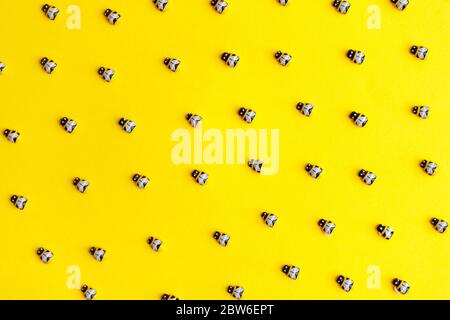 bees on yellow background for wallpaper design. Stock Photo