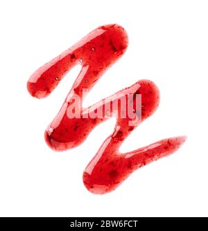 Cherry jam drizzle isolated on white background. Splashes of red berry jam. Top view. Stock Photo