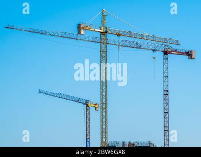 Construction crane or building crane on a construction site. Stock Photo