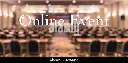 Online Event Text over blur photo of conference hall or seminar room without attendee background, Offline is over, online transmission and television Stock Photo