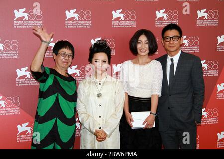 VENICE, ITALY - SEPTEMBER 05: Ann Hui, Deanie Ip, Qin Hailu and Andy Lau attends the 'Tao Jie' Photocall during the 68th Venice Film Festiva Stock Photo