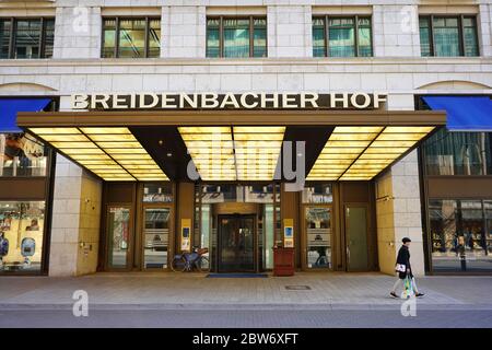 Exterior view of the luxury hotel „Breidenbacher Hof“ on Königsallee with its unique roof. The hotel has a tradition of more than 200 years. Stock Photo