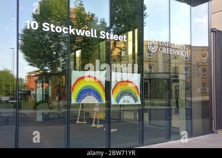 London, United Kingdom - May 08, 2020: Hand drawn rainbow expressing thank to NHS and key workers displayed at glass window University of Greenwich du Stock Photo